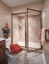 glass shower door in renovated bathroom
