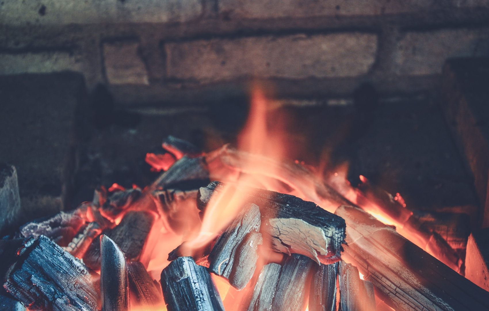 fire in a wood burning fireplace