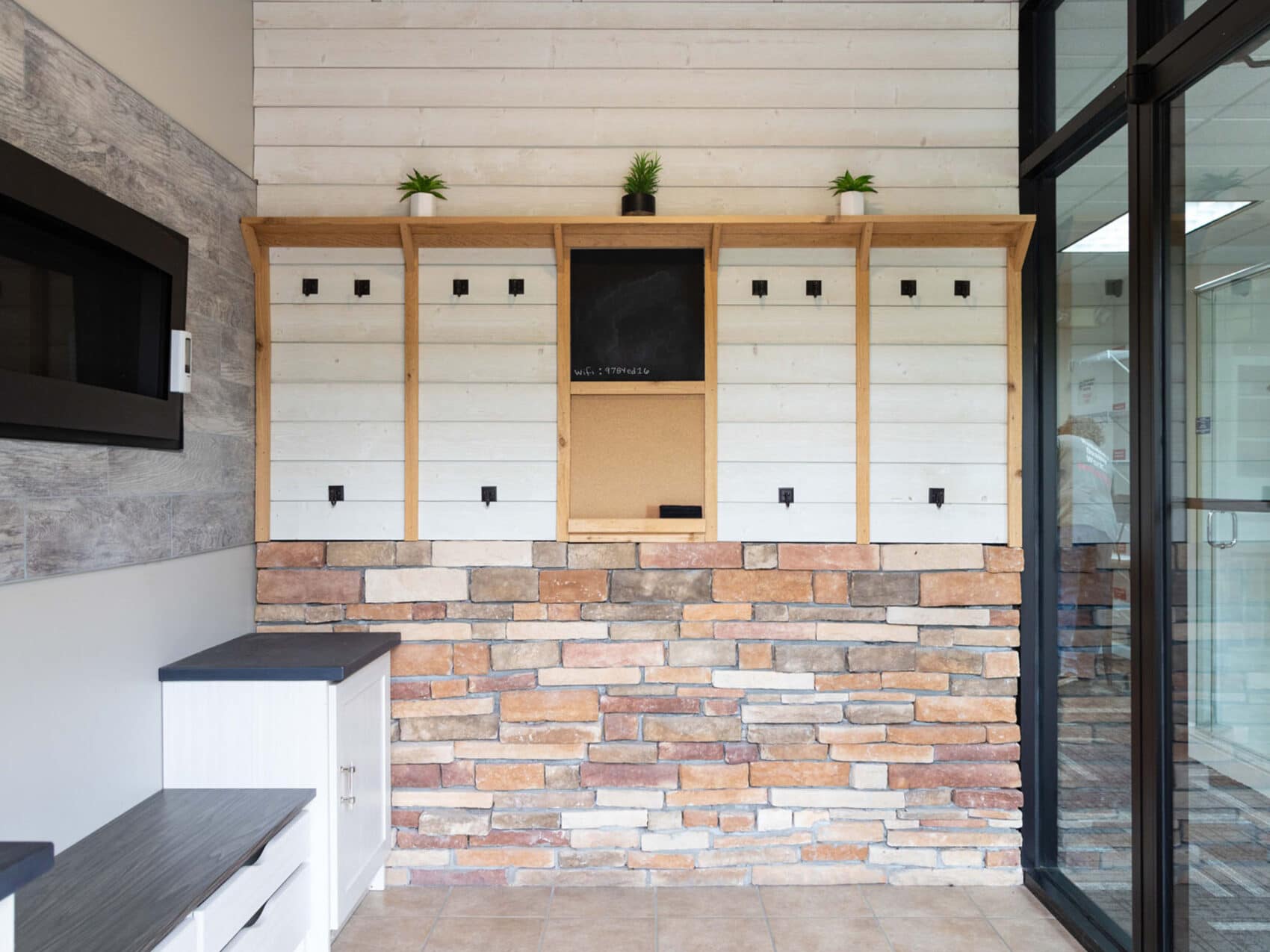 A custom mudroom with designed storage solutions