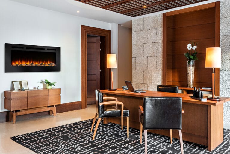 An electric fireplace in a modern office
